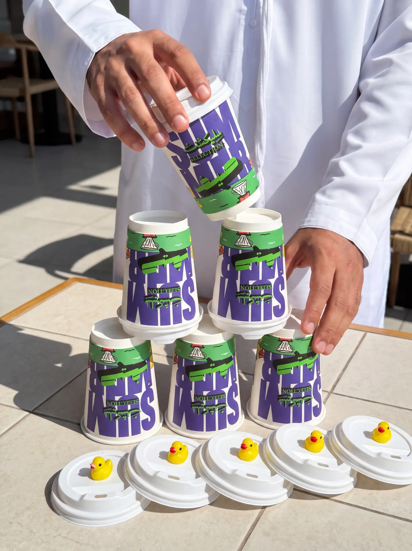 selection-summer-paper-cups-8oz-duck-lid-stacked-cafe.webp